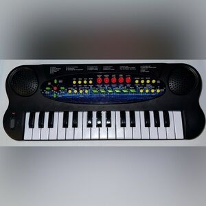 Children's Kid Connection Musical Keyboard with Black, White, and Red Accents